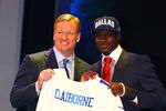 NEW YORK, NY - APRIL 26:  Morris Claiborne (R)from LSU holds up a jersey as he stands on stage with NFL Commissioner Roger Goodell after he was selected #6 overall by the Dallas Cowboys in the first round of during the 2012 NFL Draft at Radio City Music Hall on April 26, 2012 in New York City.  (Photo by Al Bello/Getty Images)