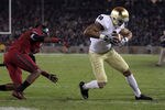 STANFORD, CA - NOVEMBER 26:  Michael Floyd #3 of the Notre Dame Fighting Irish gets past Wayne Lyons #2 of the Stanford Cardinal to score a touchdown at Stanford Stadium on November 26, 2011 in Stanford, California.  (Photo by Ezra Shaw/Getty Images)