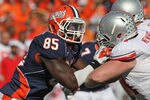 CHAMPAIGN, IL - OCTOBER 15:  Whitney Mercilus #85 of the Illinois Fighting Illini rushes against Jack Mewhort #74 of the Ohio State Buckeyes at Memorial Stadium on October 15, 2011 in Champaign, Illinois. Ohio State defeated Illinois 17-7.  (Photo by Jonathan Daniel/Getty Images)
