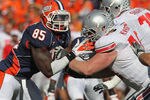 CHAMPAIGN, IL - OCTOBER 15:  Whitney Mercilus #85 of the Illinois Fighting Illini rushes against Jack Mewhort #74 of the Ohio State Buckeyes at Memorial Stadium on October 15, 2011 in Champaign, Illinois. Ohio State defeated Illinois 17-7.  (Photo by Jonathan Daniel/Getty Images)