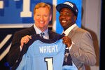 NEW YORK, NY - APRIL 26:  Kendall Wright from Baylor holds up a jersey as he stands on stage with NFL Commissioner Roger Goodell after he was selected #20 overall by the Tennesse Titians in the first round of the 2012 NFL Draft at Radio City Music Hall on April 26, 2012 in New York City.  (Photo by Al Bello/Getty Images)