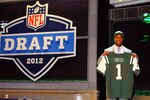 NEW YORK, NY - APRIL 26:  Quinton Coples of North Carolina holds up a jersey as he stands on stage after he was selected #16 overall by the New York Jets in the first round of the 2012 NFL Draft at Radio City Music Hall on April 26, 2012 in New York City.  (Photo by Al Bello/Getty Images)