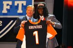 NEW YORK, NY - APRIL 26:  Dre Kirkpatrick (R) of Alabama holds up a jersey as he stands on stage with NFL Commissioner Roger Goodell after he was selected #17 overall by the Cincinnati Bengals in the first round of during the 2012 NFL Draft at Radio City Music Hall on April 26, 2012 in New York City.  (Photo by Al Bello/Getty Images)