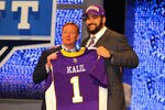NEW YORK, NY - APRIL 26:  Matt Kalil (R) from USC holds up a jersey as he stands on stage with NFL Commissioner Roger Goodell after he was selected #4 overall by the Minnesota Vikings in the first round of the 2012 NFL Draft at Radio City Music Hall on April 26, 2012 in New York City.  (Photo by Al Bello/Getty Images)