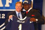 NEW YORK, NY - APRIL 26:  Melvin Ingram of South Carolina holds up a jersey as he stands on stage with NFL Commissioner Roger Goodell after he was selected #18 overall by the San Diego Chargers in the first round of the 2012 NFL Draft at Radio City Music Hall on April 26, 2012 in New York City.  (Photo by Al Bello/Getty Images)