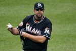 NEW YORK, NY - APRIL 26: Heath Bell #21 of the Miami Marlins looks on during the game against the New York Mets at Citi Field on April 26, 2012 in the Flushing neighborhood of the Queens borough of New York City. Mets defeated the Marlins 3-2.  (Photo by Mike Stobe/Getty Images)
