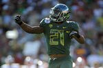 PASADENA, CA - JANUARY 02:  Running back LaMichael James #21 of the Oregon Ducks celebrates his one-yard touchdown run in the first quarter against the Wisconsin Badgers at the 98th Rose Bowl Game on January 2, 2012 in Pasadena, California.  (Photo by Harry How/Getty Images)