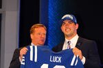 NEW YORK, NY - APRIL 26:  Andrew Luck (R) from Stanford holds up a jersey as he stands on stage with NFL Commissioner Roger Goodell after Luck was selected #1 overall by the Indianapolis Colts in the first round of the 2012 NFL Draft at Radio City Music Hall on April 26, 2012 in New York City.  (Photo by Al Bello/Getty Images)