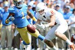 PASADENA, CA - SEPTEMBER 17:  Jaxon Shipley #8 of the Texas Longhorns fumbles the ball on a reutrn in front of Dietrich Riley #1 of the UCLA Bruins during the first quarter at Rose Bowl on September 17, 2011 in Pasadena, California.  (Photo by Harry How/Getty Images)
