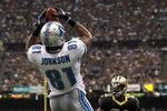 NEW ORLEANS, LA - JANUARY 07:  Calvin Johnson #81 of the Detroit Lions catches a pass for a touchdown in the second quarter against the New Orleans Saints during their 2012 NFC Wild Card Playoff game at Mercedes-Benz Superdome on January 7, 2012 in New Orleans, Louisiana.  (Photo by Ronald Martinez/Getty Images)
