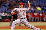 ST PETERSBURG, FL - APRIL 25:  Pitcher C.J. Wilson #33 of the Los Angeles Angels of Anaheim pitches against the Tampa Bay Rays during the game at Tropicana Field on April 25, 2012 in St. Petersburg, Florida.  (Photo by J. Meric/Getty Images)