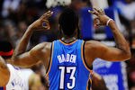 LOS ANGELES, CA - APRIL 16: James Harden #13 of the Oklahoma City Thunder reacts afterscoring a three point basket against the Los Angeles Clippers during the second quarter of the NBA basketball game at Staples Center on April 16, 2012 in Los Angeles, California.NOTE TO USER: User expressly acknowledges and agrees that, by downloading and or using this photograph, User is consenting to the terms and conditions of the Getty Images License Agreement.  (Photo by Kevork Djansezian/Getty Images)