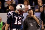 INDIANAPOLIS, IN - FEBRUARY 05:  Tom Brady #12 of the New England Patriots talks with head coach Bill Belichick against the New York Giants during Super Bowl XLVI at Lucas Oil Stadium on February 5, 2012 in Indianapolis, Indiana.  (Photo by Win McNamee/Getty Images)