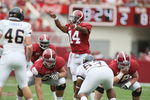 TUSCALOOSA, AL - SEPTEMBER 3:  Quarterback Phillip Sims #14 of the Alabama Crimson Tide calls out coverage's during the game with the Kent State Golden Flashes on September 3, 2011 at Bryant Denny Stadium in Tuscaloosa, Alabama.  Alabama defeated Kent State 48-7.  (Photo by Greg McWilliams/Getty Images)