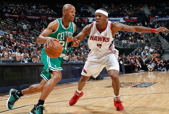 ATLANTA, GA - APRIL 01:  Ray Allen #20 of the Boston Celtics against Joe Johnson #2 of the Atlanta Hawks at Philips Arena on April 1, 2011 in Atlanta, Georgia.  NOTE TO USER: User expressly acknowledges and agrees that, by downloading and/or using this Photograph, user is consenting to the terms and conditions of the Getty Images License Agreement.  (Photo by Kevin C. Cox/Getty Images)