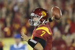 LOS ANGELES, CA - NOVEMBER 26:  Quarterback Matt Barkley #7 of the USC Trojans throws a pass against the UCLA Bruins at the Los Angeles Memorial Coliseum on November 26, 2011 in Los Angeles, California.  (Photo by Stephen Dunn/Getty Images)