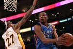 LOS ANGELES, CA - APRIL 22:  Kevin Durant #35 of the Oklahoma City Thunder goes up with ball against Jordan Hill #27 of the Los Angeles Lakers at Staples Center on April 22, 2012 in Los Angeles, California. The  Lakers won 114-106 in double overtime.  NOTE TO USER: User expressly acknowledges and agrees that, by downloading and or using this photograph, User is consenting to the terms and conditions of the Getty Images License Agreement.  (Photo by Stephen Dunn/Getty Images)