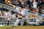 WASHINGTON, DC - SEPTEMBER 23:  Tim Hudson #15 of the Atlanta Braves pitches against the Washington Nationals at Nationals Park on September 23, 2011 in Washington, DC.  (Photo by Greg Fiume/Getty Images)