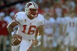 PASADENA, CA - JANUARY 02:  Quarterback Russell Wilson #16 of the Wisconsin Badgers looks to pass the ball in the first half against the Oregon Ducks at the 98th Rose Bowl Game on January 2, 2012 in Pasadena, California.  (Photo by Harry How/Getty Images)
