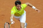 BARCELONA, SPAIN - APRIL 28: Milos Raonic of Canada returns the ball against David Ferrer of Spain during their Semi-final match of the ATP 500 World Tour Barcelona Open Banco Sabadell 2012 tennis tournament at the Real Club de Tenison April 28, 2012 in Barcelona, Spain. Ferrer won 7-6, 7-6.  (Photo by David Ramos/Getty Images)