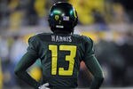 EUGENE, OR - NOVEMBER 26: Cornerback Cliff Harris #13 of the Oregon Ducks waits at the line of scrimmage in the fourth quarter of the game against the Arizona Wildcats at Autzen Stadium on November 26, 2010 in Eugene, Oregon. (Photo by Steve Dykes/Getty Images)