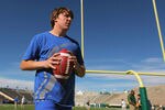 FORT COLLINS, CO - OCTOBER 15:  Quarterback Kellen Moore #11 of the Boise State Broncos warms up prior to facing the Colorado State Rams at Sonny Lubick Field at Hughes Stadium on October 15, 2011 in Fort Collins, Colorado.  (Photo by Doug Pensinger/Getty Images)