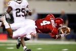 ARLINGTON, TX - OCTOBER 03:  Wide receiver Jarius Wright #4 of the Arkansas Razorbacks makes a touchdown pass reception against the Texas A&M Aggies at Dallas Cowboys Stadium on October 3, 2009 in Arlington, Texas.  (Photo by Ronald Martinez/Getty Images)