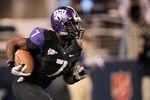 ARLINGTON, TX - OCTOBER 28:  Greg McCoy #7 of the TCU Horned Frogs runs during a game against the BYU Cougars at Cowboys Stadium on October 28, 2011 in Arlington, Texas. The TCU Horned Frogs defeated the BYU Cougars 38-28.  (Photo by Sarah Glenn/Getty Images)