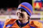 BOISE, ID - DECEMBER 03: Kellen Moore #11 of the Boise State Broncos smiles during an interview after the game against the New Mexico Lobos at Bronco Stadium on December 3, 2011 in Boise, Idaho.  (Photo by Otto Kitsinger III/Getty Images)