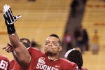 TEMPE, AZ - DECEMBER 30:  Linebacker Travis Lewis #28 of the Oklahoma Sooners celebrates following the Insight Bowl against the Iowa Hawkeyes at Sun Devil Stadium on December 30, 2011 in Tempe, Arizona. The Sooners defeated the Hawkeyes 31-14.  (Photo by Christian Petersen/Getty Images)