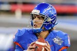 LAS VEGAS, NV - DECEMBER 22:  Quarterback Kellen Moore #11 of the Boise State Broncos warms up before playing the Arizona State Sun Devils in the MAACO Bowl Las Vegas at Sam Boyd Stadium December 22, 2011 in Las Vegas, Nevada. Boise State won 56-24.  (Photo by Ethan Miller/Getty Images)