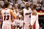 MIAMI, FL - APRIL 28:  Forward LeBron James #6 (C) Guard Dwyane Wade #3 and Forward Mike Miller #13  of the Miami Heat celebrate against the New York Knicks  in Game One of the Eastern  Conference Quarterfinals in the 2012 NBA Playoffs  on April 28, 2012 at the American Airines Arena in Miami, Florida. NOTE TO USER: User expressly acknowledges and agrees that, by downloading and or using this photograph, User is consenting to the terms and conditions of the Getty Images License Agreement.  (Photo by Marc Serota/Getty Images)