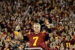 LOS ANGELES, CA - NOVEMBER 26:  Quarterback Matt Barkley #7 of the USC Trojans conducts the band after the game with the UCLA Bruins at the Los Angeles Memorial Coliseum on November 26, 2011 in Los Angeles, California. USC won 50-0.  (Photo by Stephen Dunn/Getty Images)