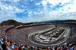 BRISTOL, TN - MARCH 18:  Cars race during the NASCAR Sprint Cup Series Food City 500 at Bristol Motor Speedway on March 18, 2012 in Bristol, Tennessee.  (Photo by Jared C. Tilton/Getty Images)
