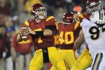 LOS ANGELES, CA - NOVEMBER 26:  Quarterback Matt Barkley #7 of the USC Trojans throws a pass against the UCLA Bruins at the Los Angeles Memorial Coliseum on November 26, 2011 in Los Angeles, California.  (Photo by Stephen Dunn/Getty Images)