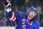 NEW YORK, NY - APRIL 28:  Brad Richards #19 of the New York Rangers aknowledges the crowd after being named a star of the game in their 3 to 1 win over the Washington Capitals in Game One of the Eastern Conference Semifinals during the 2012 NHL Stanley Cup Playoffs at Madison Square Garden on April 28, 2012 in New York City.  (Photo by Bruce Bennett/Getty Images)