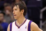 PHOENIX, AZ - APRIL 25:  Steve Nash #13 of the Phoenix Suns high fives Marcin Gortat #4 during the NBA game against the San Antonio Spurs at US Airways Center on April 25, 2012 in Phoenix, Arizona.  The Spurs defeated the Suns 110-106.  NOTE TO USER: User expressly acknowledges and agrees that, by downloading and or using this photograph, User is consenting to the terms and conditions of the Getty Images License Agreement.  (Photo by Christian Petersen/Getty Images)