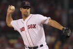 BOSTON, MA - SEPTEMBER 13:  Tim Wakefield #49 of the Boston Red Sox throws against the Toronto Blue Jays, seeing his 200th win, at Fenway Park September 13, 2011 in Boston, Massachusetts. (Photo by Jim Rogash/Getty Images)