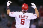 ANAHEIM, CA - APRIL 30:  Albert Pujols #5 of the Los Angeles Angels of Anaheim looks skyward after hitting a double against the Minnesota Twins in the first inning at Angel Stadium of Anaheim on April 30, 2012 in Anaheim, California. The Angels defeated the Twins 4-3.  (Photo by Jeff Gross/Getty Images)