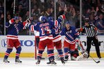 NEW YORK, NY - APRIL 30:  (L-R) Marian Gaborik #10, Brad Richards #19, Michael Del Zotto #4 and Ryan Callahan #24 of the New York Rangers celebrate after Callahan scored a goal in the third period against the Washington Capitals in Game Two of the Eastern Conference Semifinals during the 2012 NHL Stanley Cup Playoffs at Madison Square Garden on April 30, 2012 in New York City.  (Photo by Bruce Bennett/Getty Images)