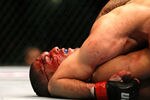 ATLANTA, GA - APRIL 21:  Che Mills is pinned by Rory MacDonald during their welterweight bout for UFC 145 at Philips Arena on April 21, 2012 in Atlanta, Georgia.  (Photo by Kevin C. Cox/Getty Images)