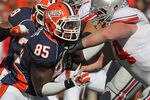 CHAMPAIGN, IL - OCTOBER 15: Whitney Mercilus #85 of the Illinois Fighting Illini rushes against Jack Mewhort #74 of the Ohio State Buckeyes at Memorial Stadium on October 15, 2011 in Champaign, Illinois. Ohio State defeated Illinois 17-7. (Photo by Jonathan Daniel/Getty Images)