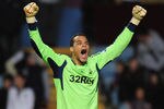 BIRMINGHAM, ENGLAND - JANUARY 02:  Michel Vorm of Swansea City celebrates at the end of the Barclays Premier League match between Aston Villa and Swansea City at Villa Park on January 2, 2012 in Birmingham, England.  (Photo by Shaun Botterill/Getty Images)