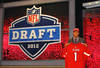 NEW YORK, NY - APRIL 26:  Michael Floyd of Notre Dame holds up a jersey as he stands on stage after he was selected #13 overall by the Arizona Cardinals in the first round of the 2012 NFL Draft at Radio City Music Hall on April 26, 2012 in New York City.  (Photo by Al Bello/Getty Images)