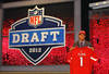 NEW YORK, NY - APRIL 26:  Michael Floyd of Notre Dame holds up a jersey as he stands on stage after he was selected #13 overall by the Arizona Cardinals in the first round of the 2012 NFL Draft at Radio City Music Hall on April 26, 2012 in New York City.  (Photo by Al Bello/Getty Images)