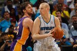 NEW ORLEANS, LA - MARCH 14:  Chris Kaman #35 of the New Orleans Hornets looks to drive the ball around Pau Gasol #16 of the Los Angeles Lakers at the New Orleans Arena on March 14, 2012 in New Orleans, Louisiana.  NOTE TO USER: User expressly acknowledges and agrees that, by downloading and or using this photograph, User is consenting to the terms and conditions of the Getty Images License Agreement.  (Photo by Chris Graythen/Getty Images)