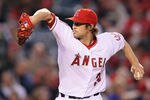 ANAHEIM, CA - APRIL 30:  C.J. Wilson #33 of the Los Angeles Angels of Anaheim pitches against the Minnesota Twins in the first inning at Angel Stadium of Anaheim on April 30, 2012 in Anaheim, California.  (Photo by Jeff Gross/Getty Images)