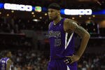 CHARLOTTE, NC - FEBRUARY 25:  DeMarcus Cousins #15 of the Sacramento Kings reacts to a call against the Charlotte Bobcats during their game at Time Warner Cable Arena on February 25, 2011 in Charlotte, North Carolina. NOTE TO USER: User expressly acknowledges and agrees that, by downloading and/or using this Photograph, User is consenting to the terms and conditions of the Getty Images License Agreement.  (Photo by Streeter Lecka/Getty Images)