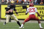 BOULDER, CO - NOVEMBER 13:  Quarterback Cody Hawkins #7 of the Colorado Buffaloes scrambles as Leonard Johnson #23 of the Iowa State Cyclones defends at Folsom Field on November 13, 2010 in Boulder, Colorado. Colorado defeated Iowa State 34-14.  (Photo by Doug Pensinger/Getty Images)