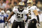 NEW ORLEANS, LA - OCTOBER 23:  Jonathan Vilma #51 of the New Orleans Saints calls a defensive play during a game against the Indianapolis Colts being held at Mercedes-Benz Superdome on October 23, 2011 in New Orleans, Louisiana.  The Saints defeated the Colts 62-7. (Photo by Stacy Revere/Getty Images)